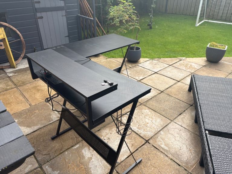 Black corner desk with built in sockets with led lights