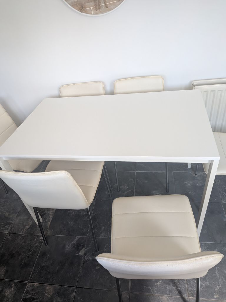 White Dining Table with 6 Cream Faux Leather Chairs