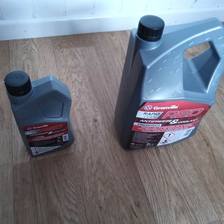 NEW unopened 4.5 litres red coolant 
