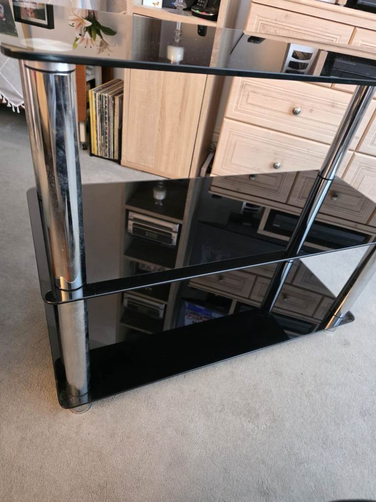 Black Glass TV Stand with Chrome Legs – Good Condition
