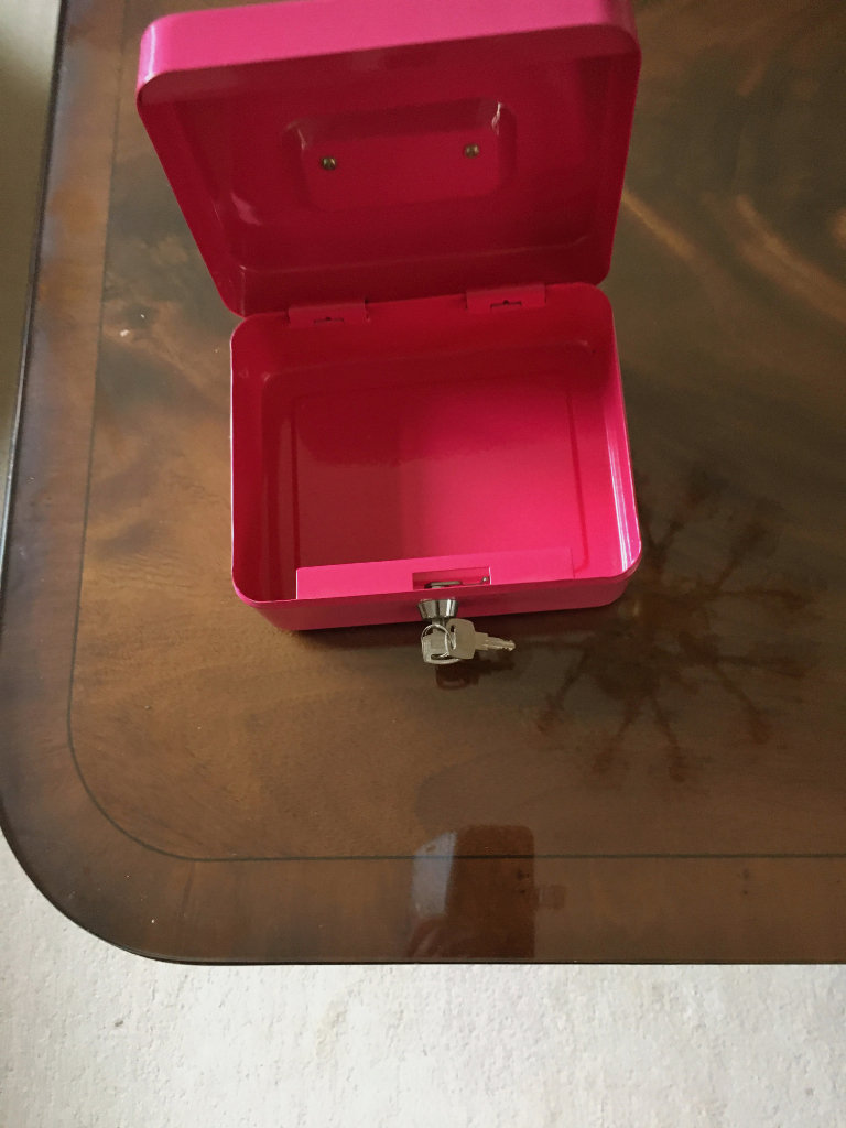 PINK COLOUR MONEY BOX  IN VERY GOOD CONDITION WITH TWO KEYS FOR SALE