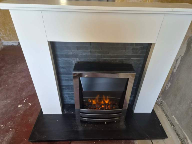 Electric fire with remote & surround  with receipts