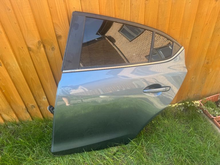 Mazda 3 rear passenger door