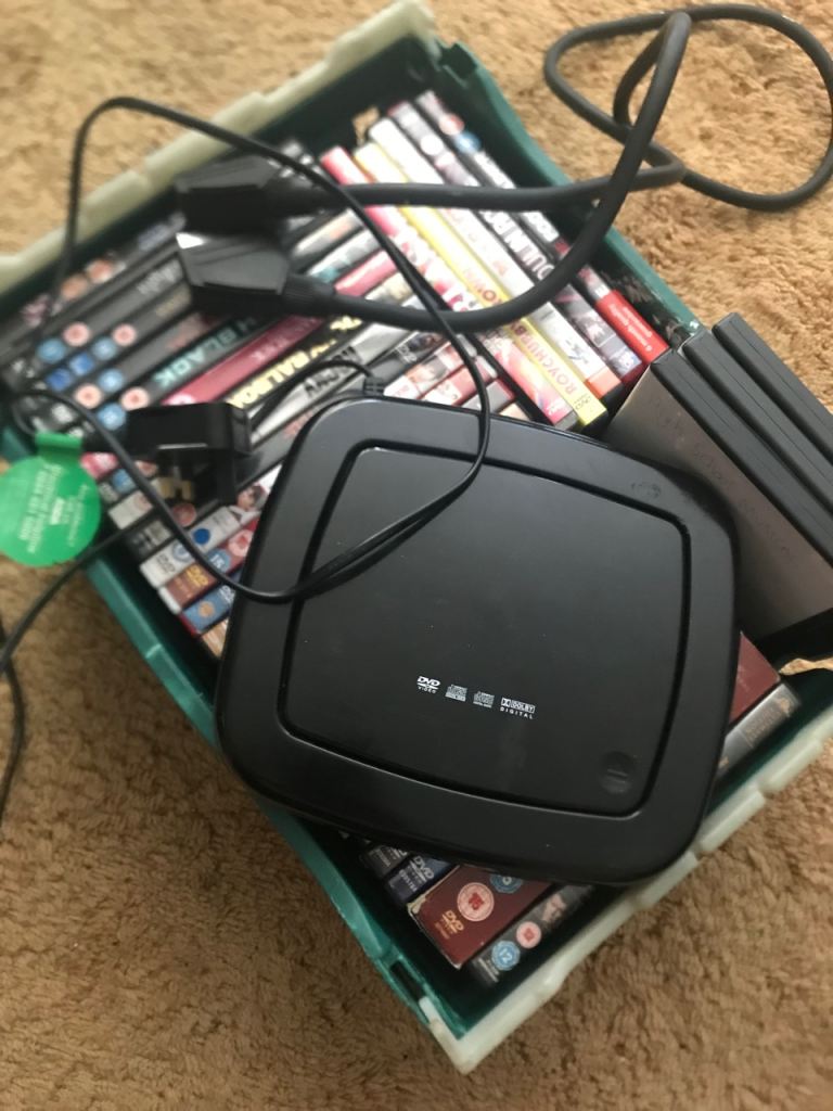 DVD player & 15 + dvds grab a bargain 10 pounds for the lot no offers 