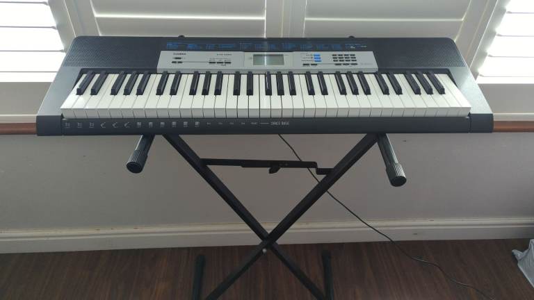Casio keyboard, with box and stand