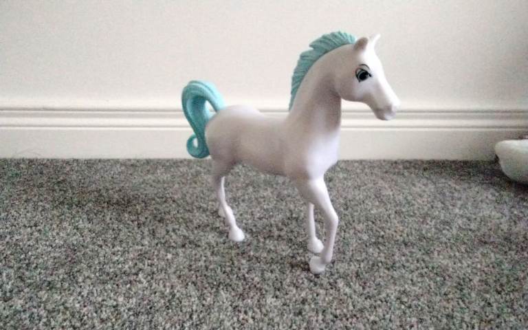 White Toy Horse with Blue Mane and Tail – Good Condition