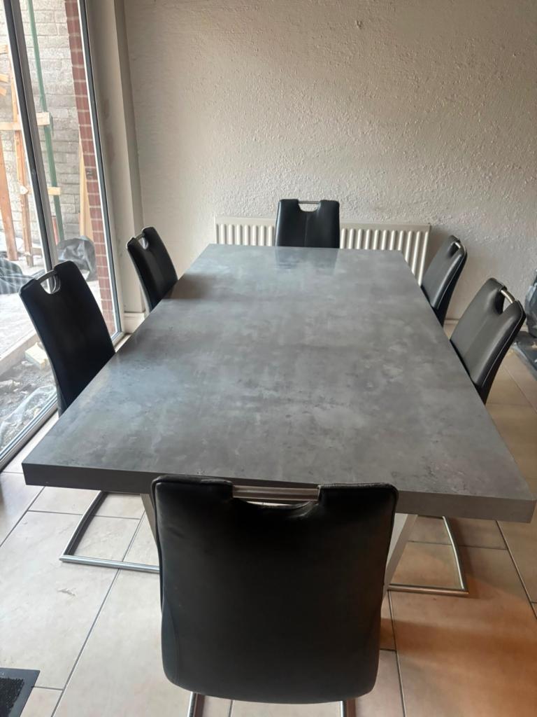 Grey Dining Table with 6 Black Faux Leather Chairs