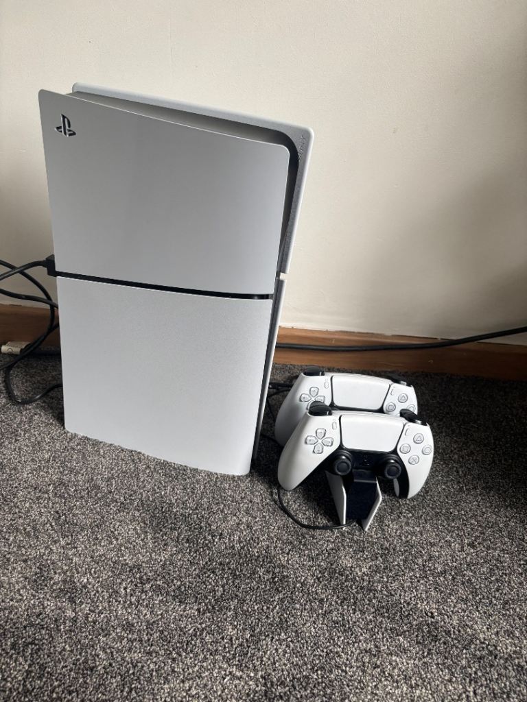 Ps5 with 2 controls and dual charging station 