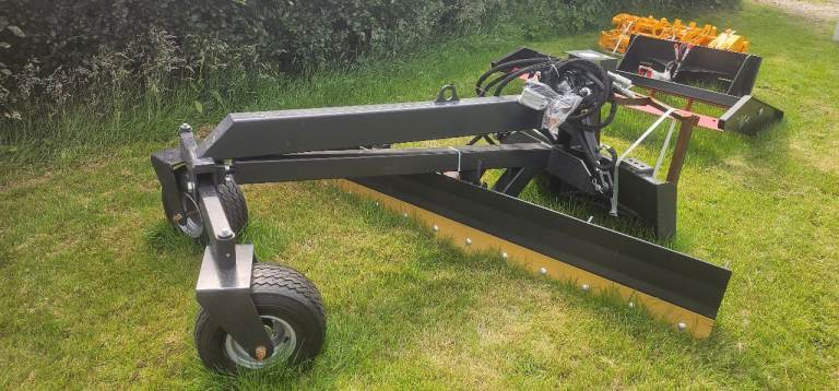 Skid steer grader