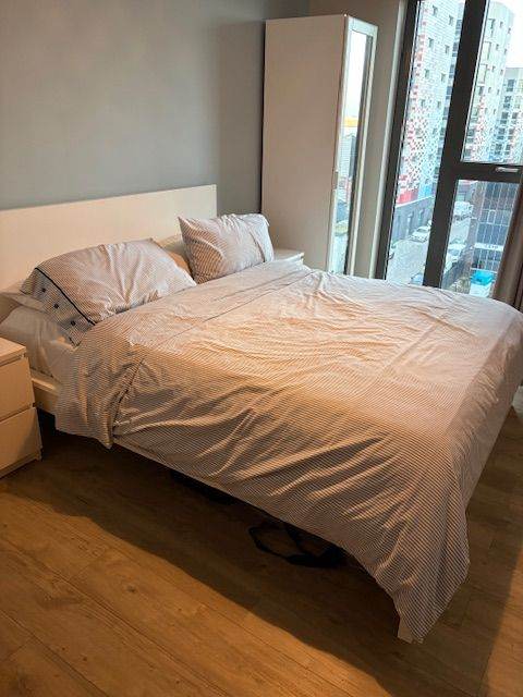 Ikea king size bed with mattress, mattress topper and chest of drawers 