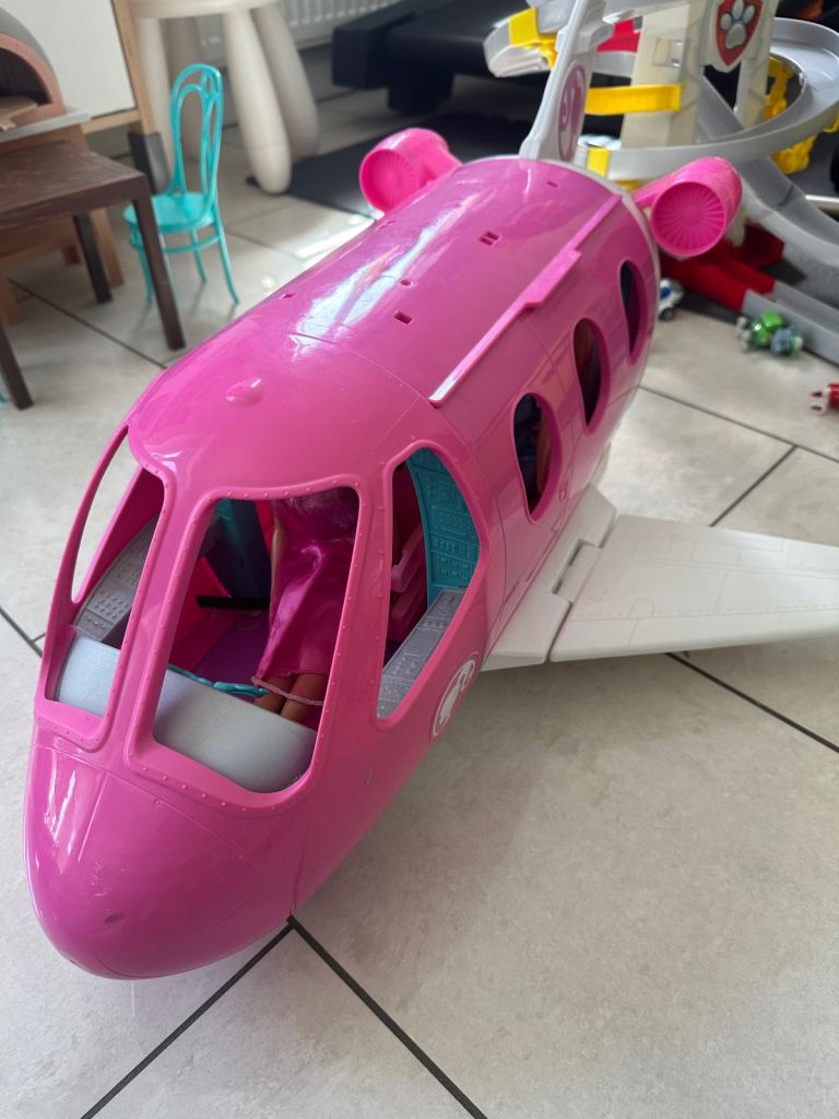 Barbie pink plane with 3 dolls
