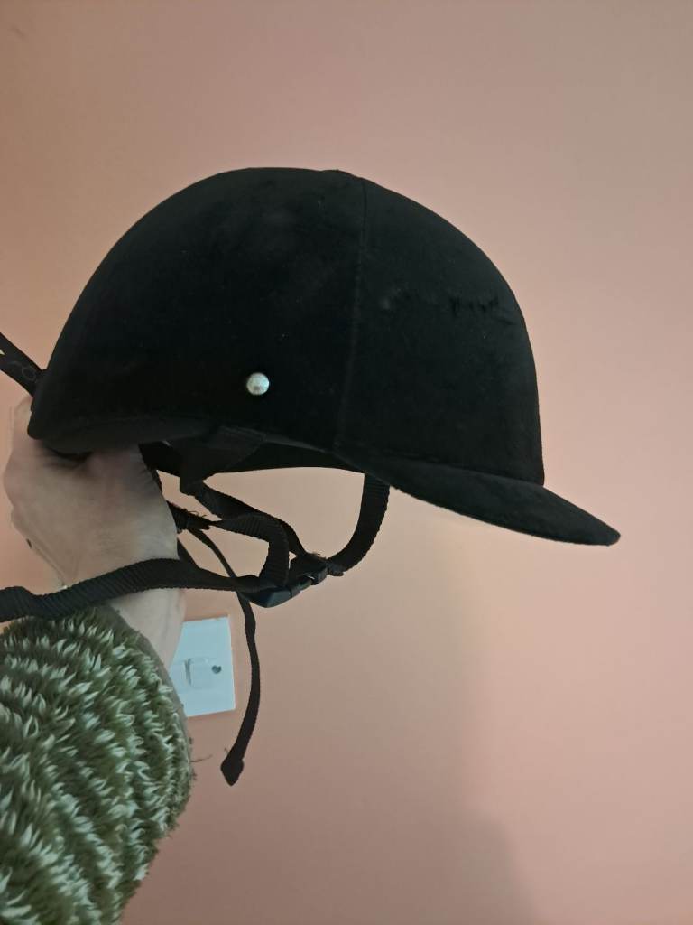 2 Equestrian helmets. One brand new.