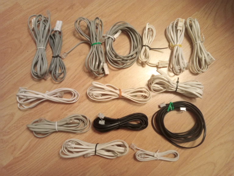 BT cables, twin phone plugs, ADSL connectors, + other connection plugs