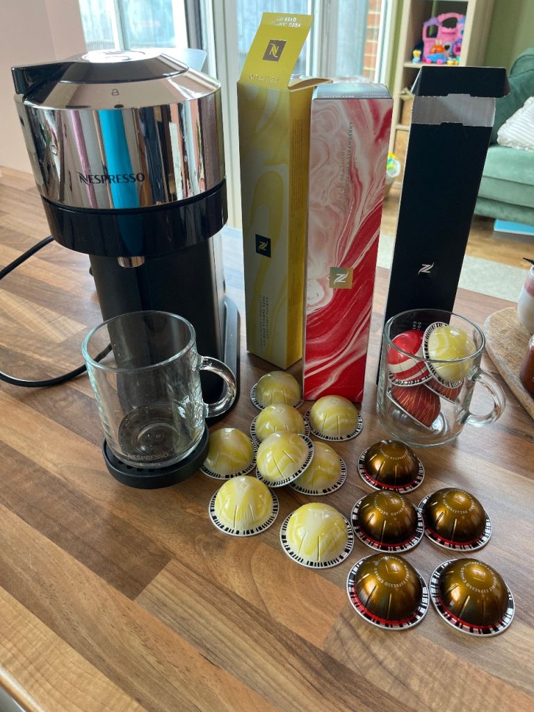 Nespresso Vertuo Coffee Machine with Pods and Mugs – Good Condition