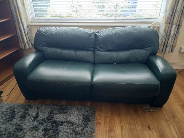 Green Leather Two-Seater Sofa bed– Good Condition