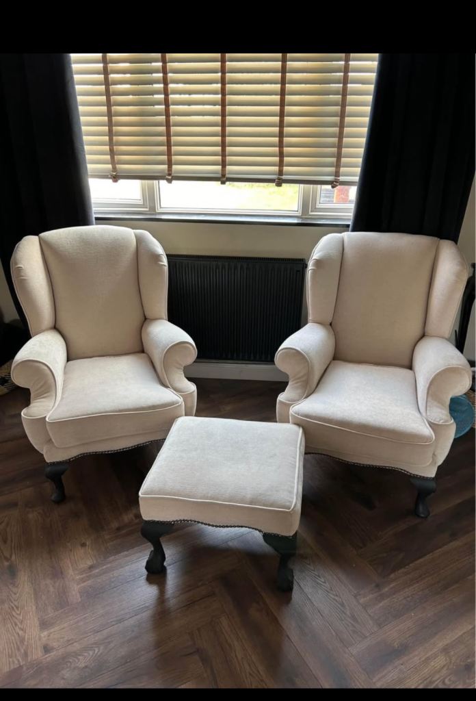 Set of two antique Queen Anne wing back arm chairs and foot stool 