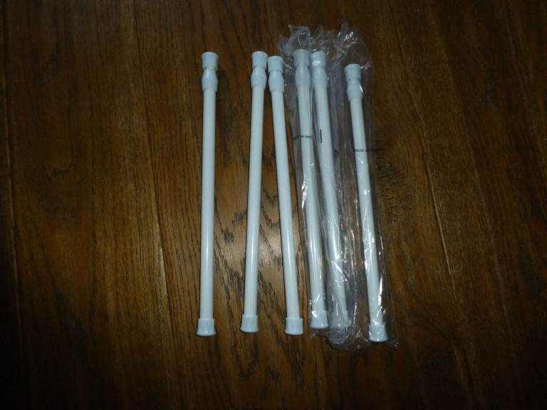 Never used 6  Tension Rods 30-50cm for curtains etc.