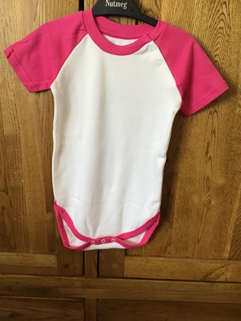 83 Brand New Unbranded 100% Cotton camouflage (59) & pink/white (24) baby body suits assorted ages