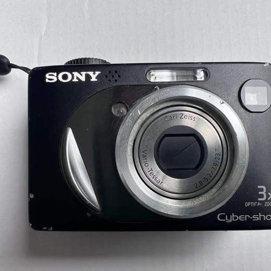 Sony Cyber-shot DSC-W12 with memory cards and charger