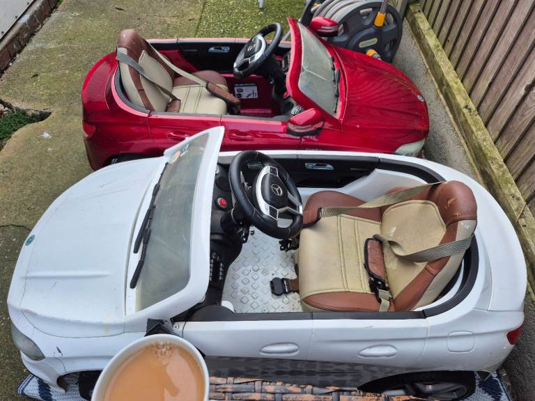 2 ride in battery mercedes toy cars ( price for both) 