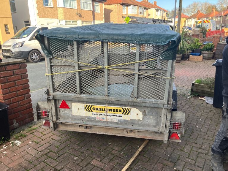 Twin axel caged trailer for sale