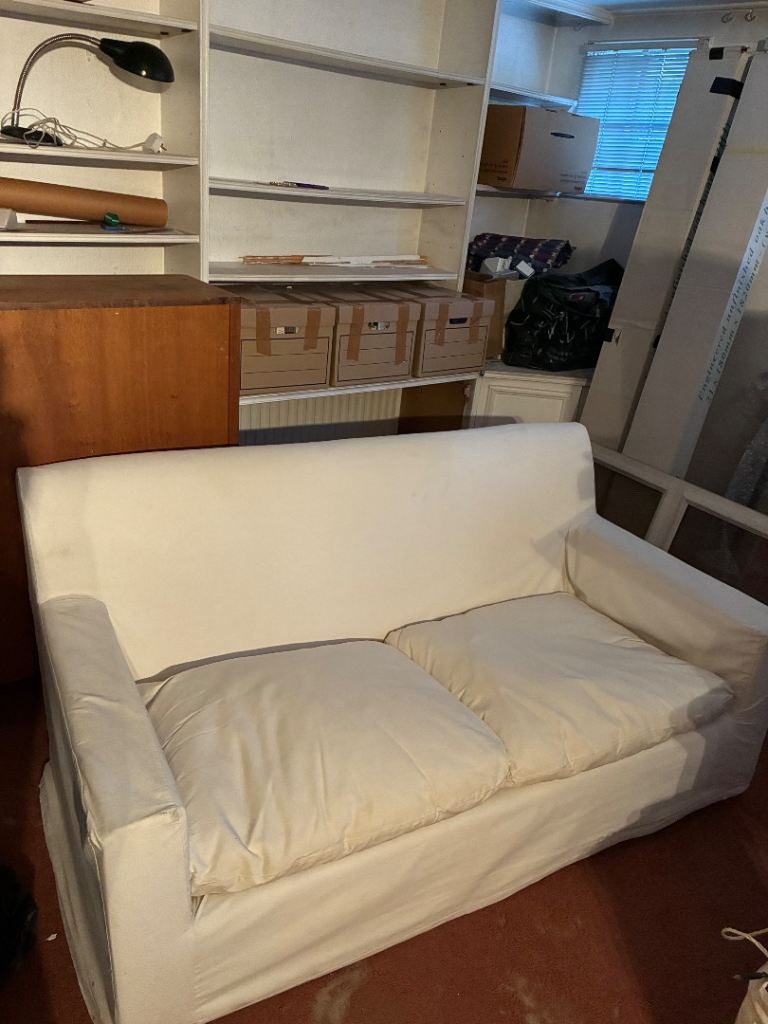 White Two-Seater Sofa – Good Condition, Removable Covers