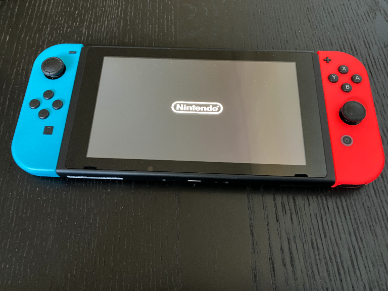 Nintendo Switch 32GB – Console + Accessories (Dock, Charger, Joy‑Cons)