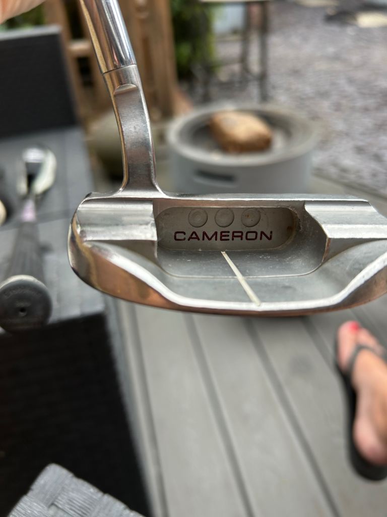 Cameron Golf Putter – Silver with Red Grip, Good Condition