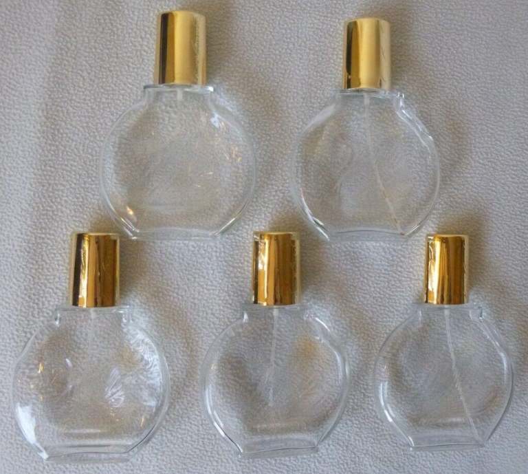 Gloria Vanderbilt Perfume Bottle empty, Embossed with Swan -Price is per Bottle  8 available