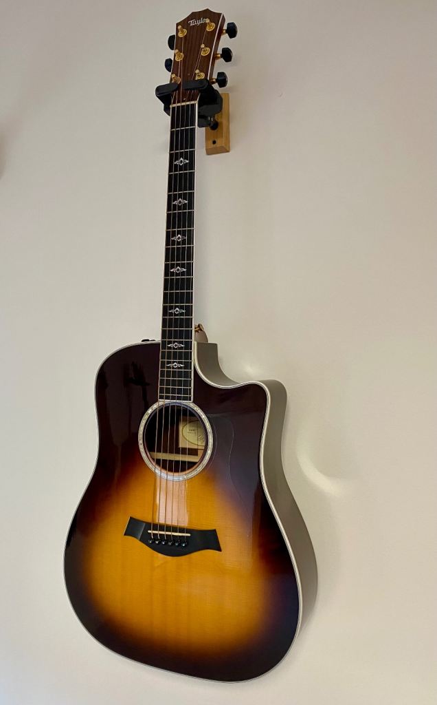 Taylor 810 ce dreadnought guitar.  Immaculate as new condition.