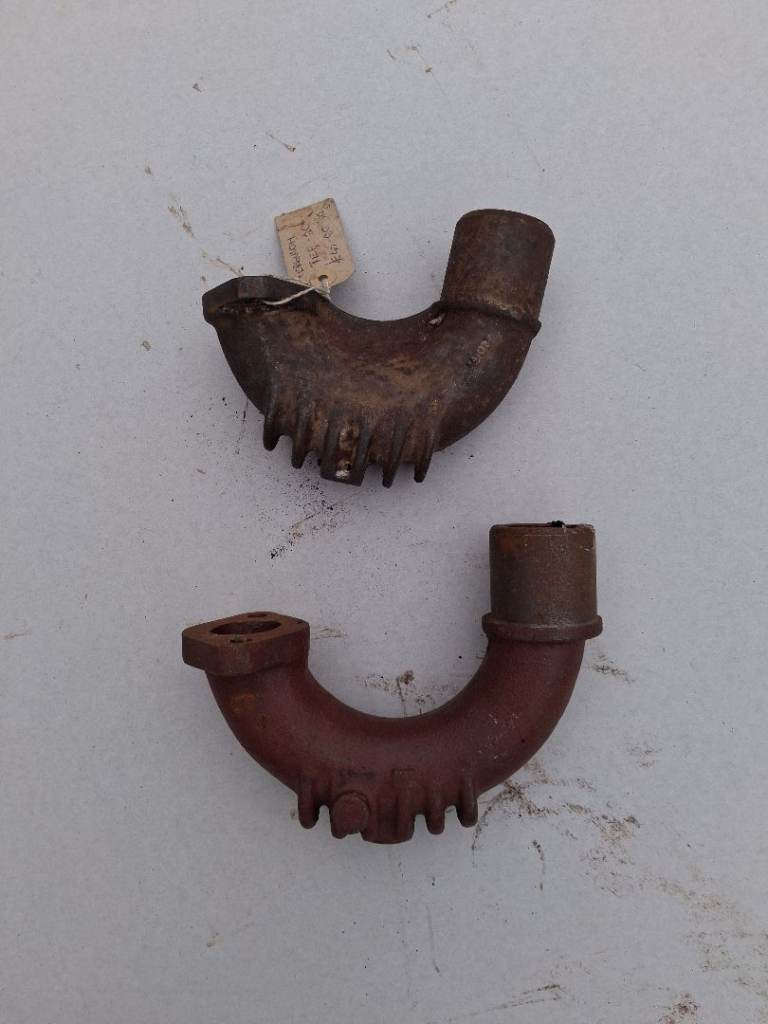 Ferguson T20 exhaust manifolds, one used, one new