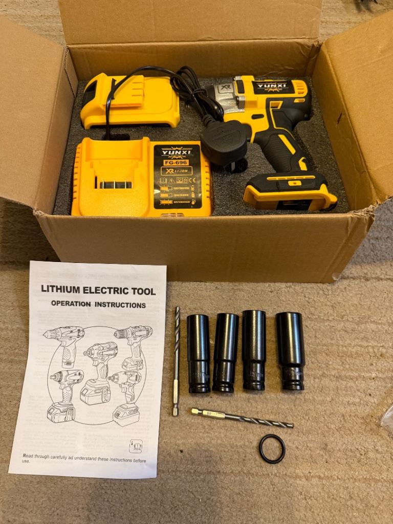 Yellow impact wrench driver with sockets new 