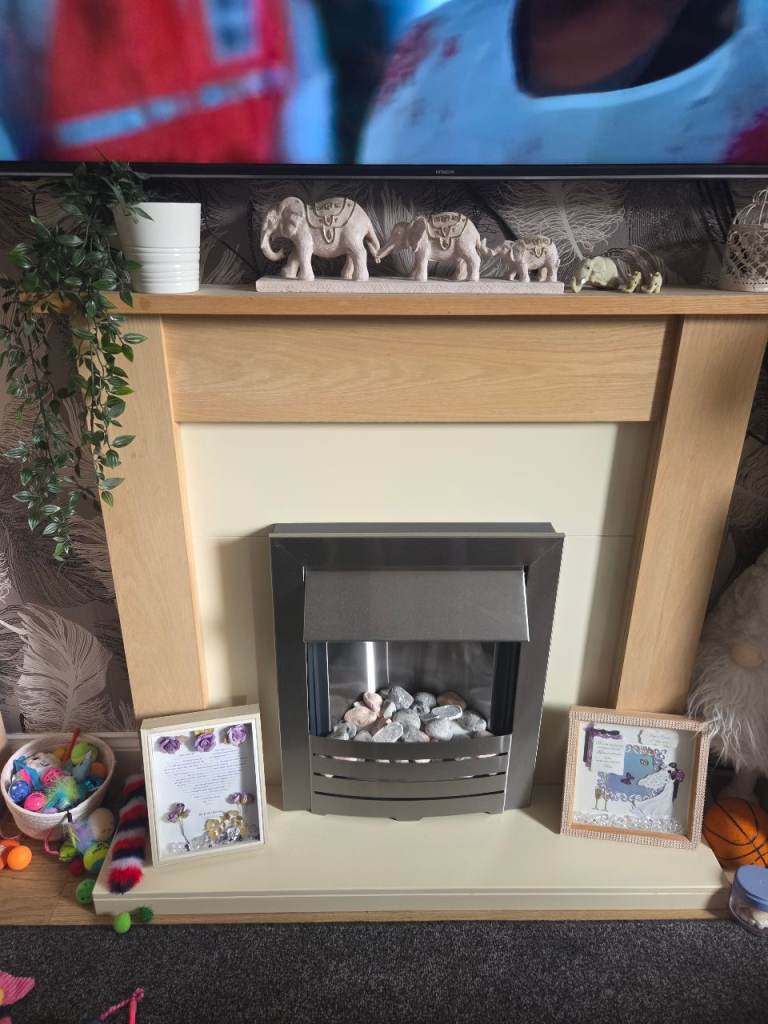 Oak and brushed steel electric fire and surround