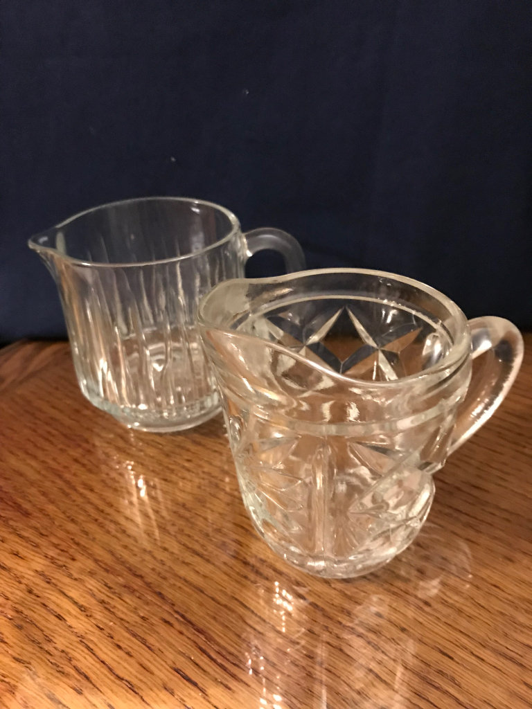 Two vintage Cream Glass Jugs