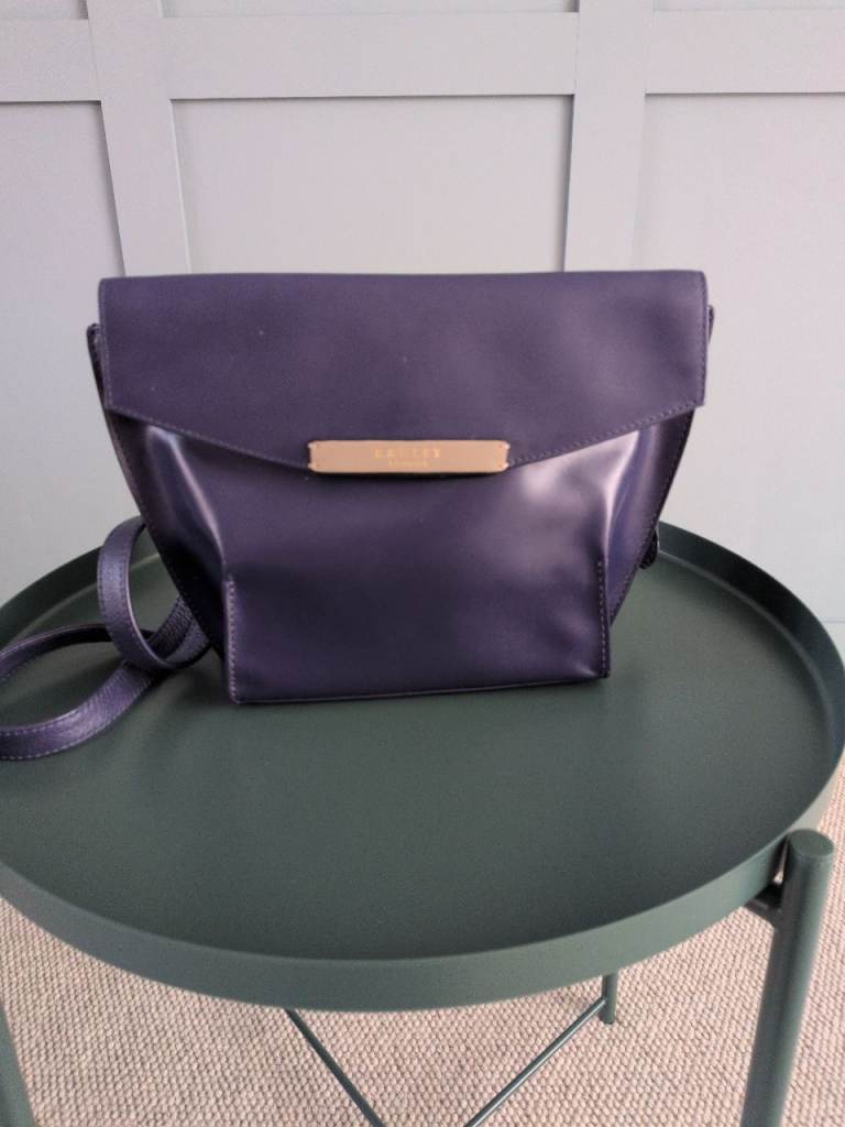 Radley purple leather handbag with adjustable shoulder strap 