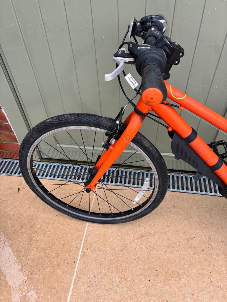 Boys Orange Carrera Saruna bike size 24”