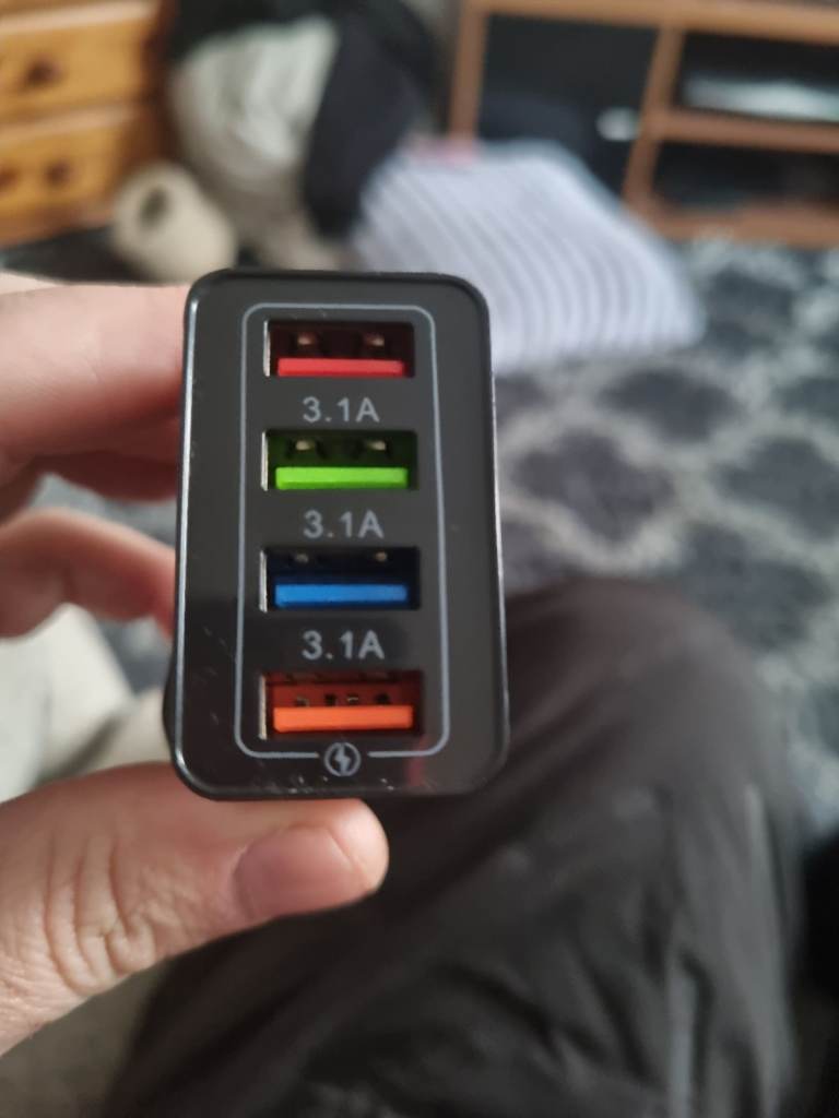 FAST CHARGER PORT ,CHARGE 4 PHONES AT ONE TIME 