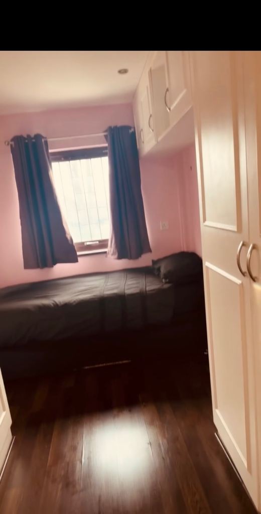 Female single box room with fitted cupboards 