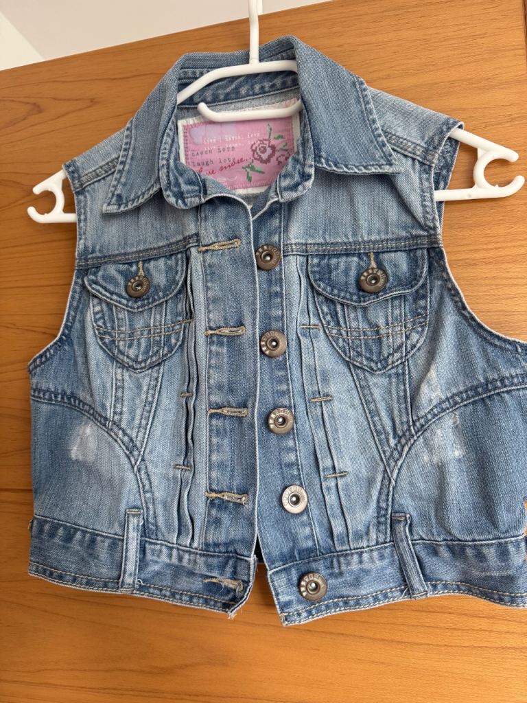 Two ladies denim cropped sleeveless jackets size 10