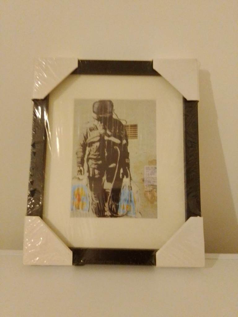 Banksy Astronaut doing shopping 