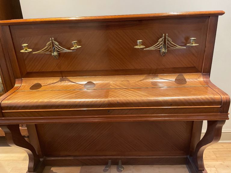 Antique upright piano Augustin Gaveau brown, H 130 cm, W 150 cm, candlesticks