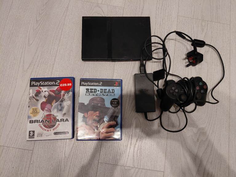 image for Ps2 slim console,  controller and games bundle 