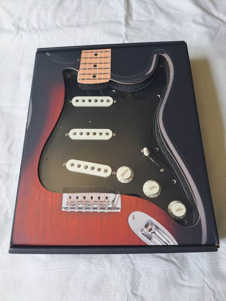 Fender loaded pickguard with Alnico 5 single coil pickups