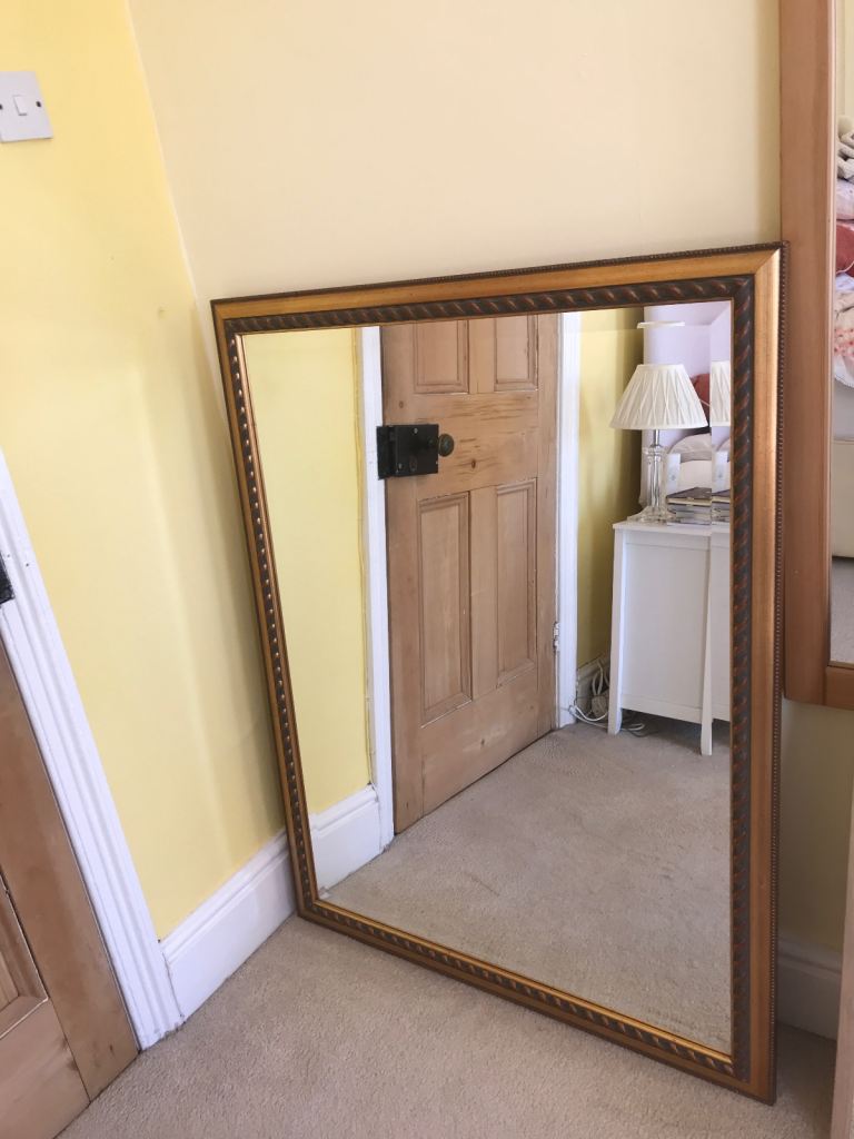 Large antique gold framed mirror. 
