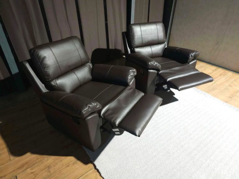 2 X Unused recliner armchair brown. RRP: £680