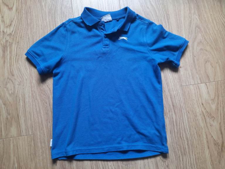 Age 13 polo top. More like 11-12. 