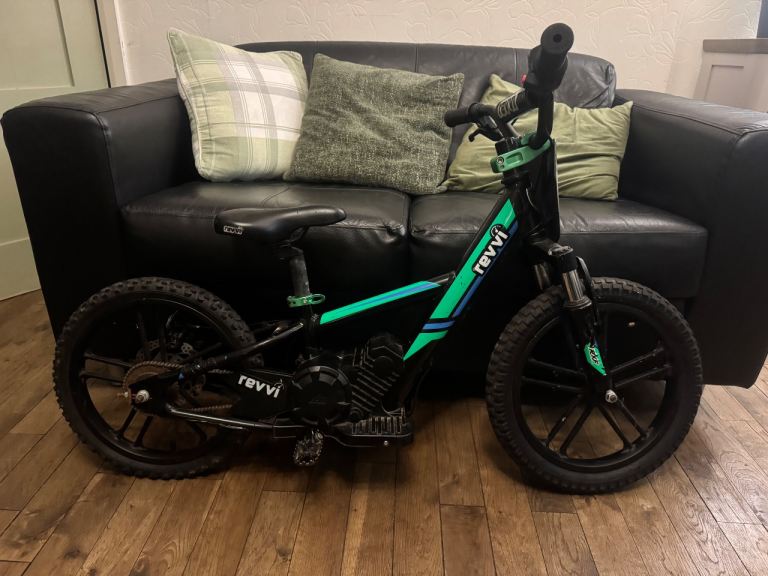 Revvi Kids Electric Bike – Black and Green, Good Condition