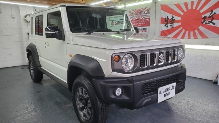 Suzuki jimny nomade 1.5 auto 4wd white new japanese import delivery miles 2025