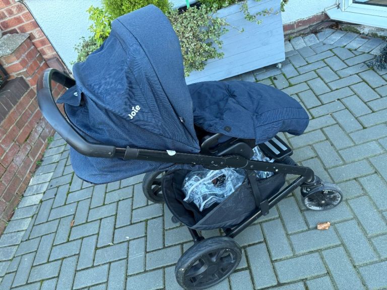 Joie Baby Buggy with foot muff and rain cover