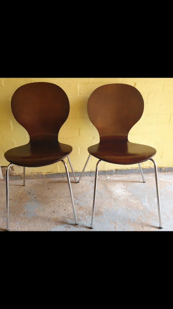 Pair of multilayered curved plywood Scandinavian style old chairs.